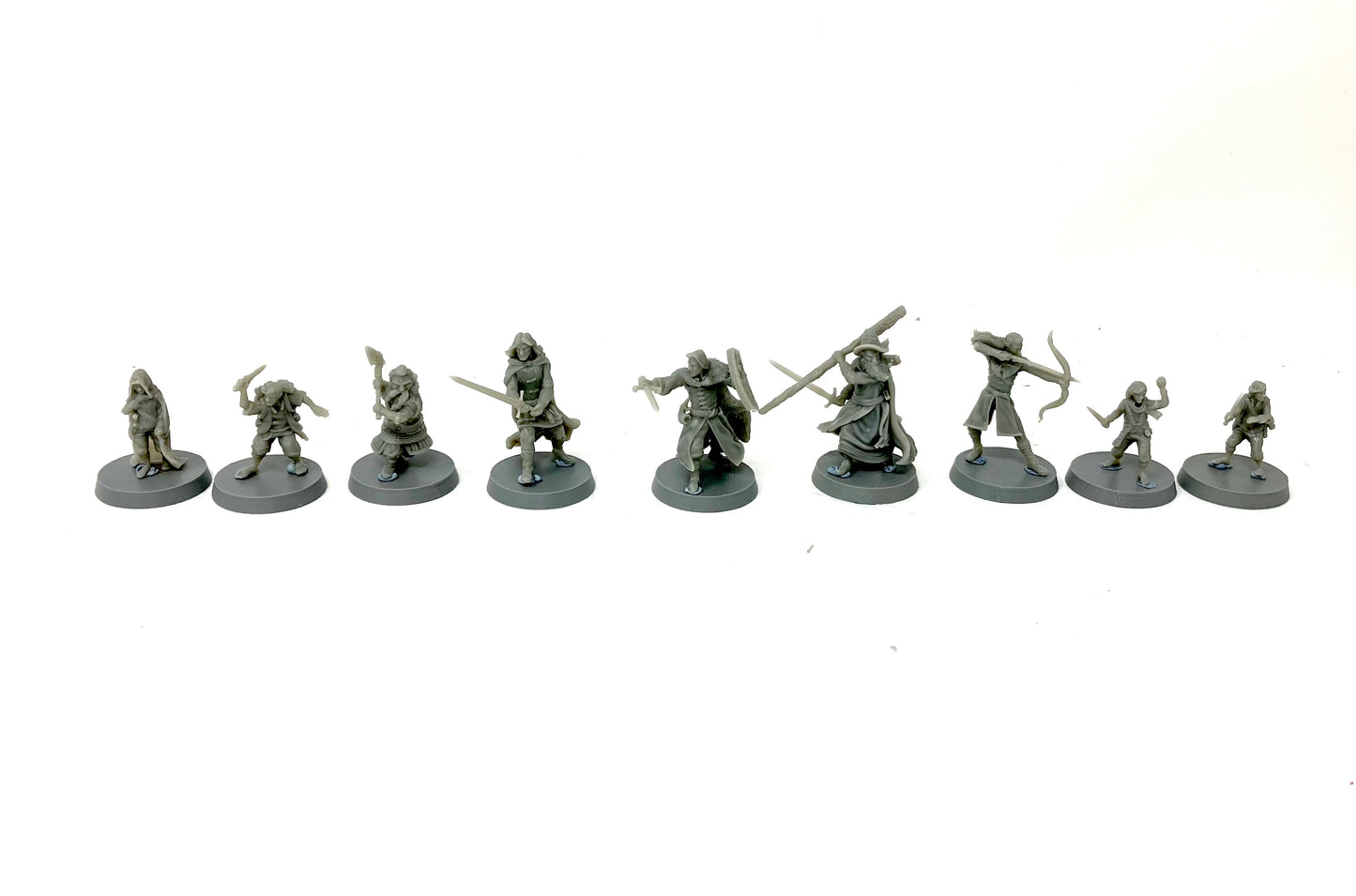 The Quests Awaits. Nine unpainted Adventurers