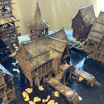 Mudifjord Building 1. A fishing village on a lake.