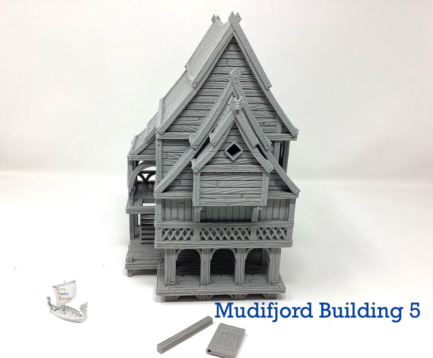 Mudifjord Building 5. A fishing village on a lake.