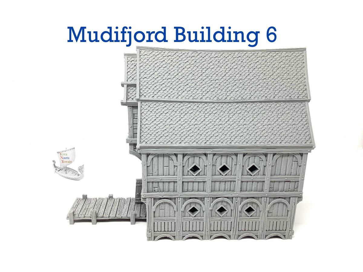 Mudifjord Building 6. A fishing village on a lake.