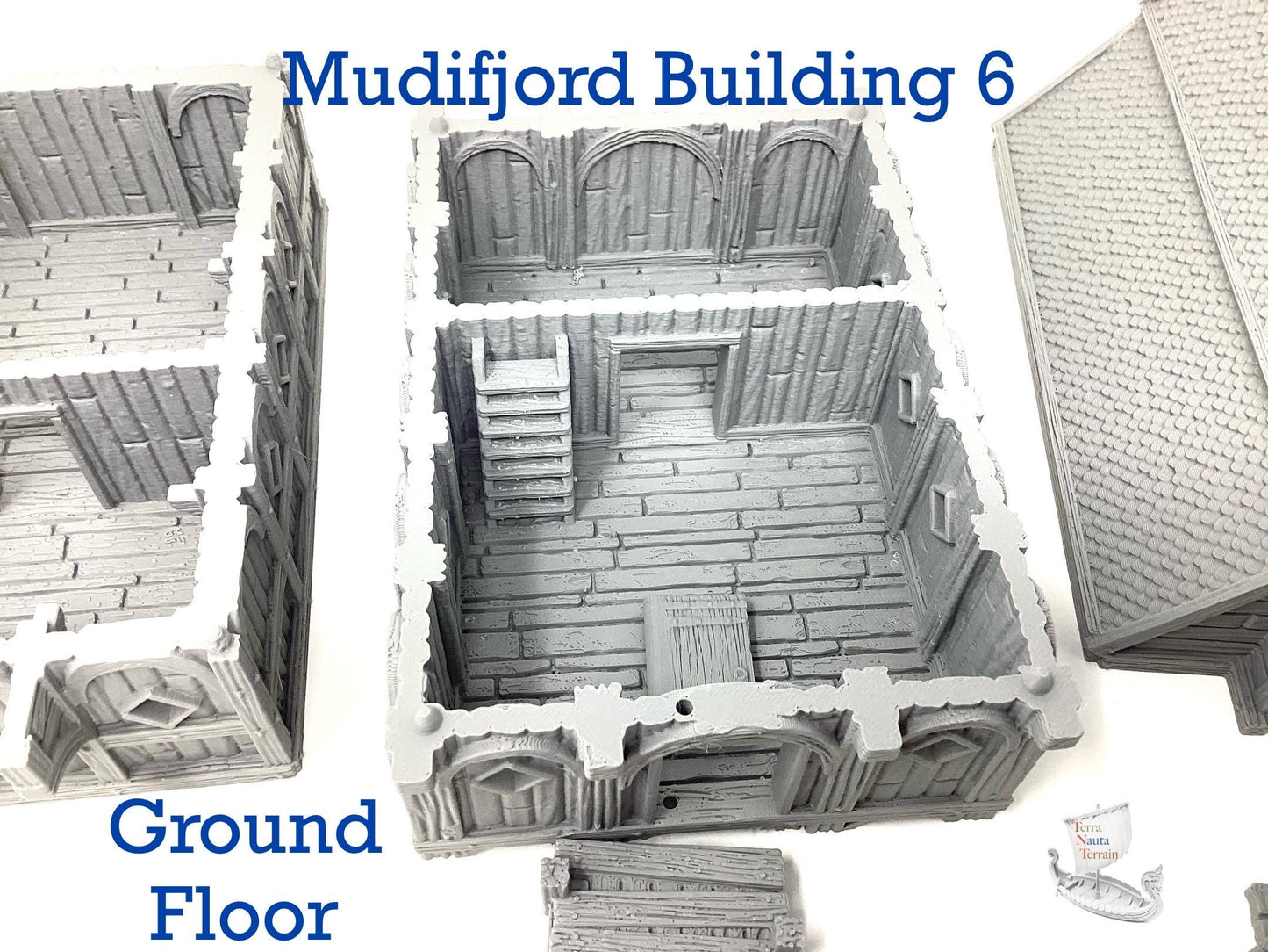 Mudifjord Building 6. A fishing village on a lake.