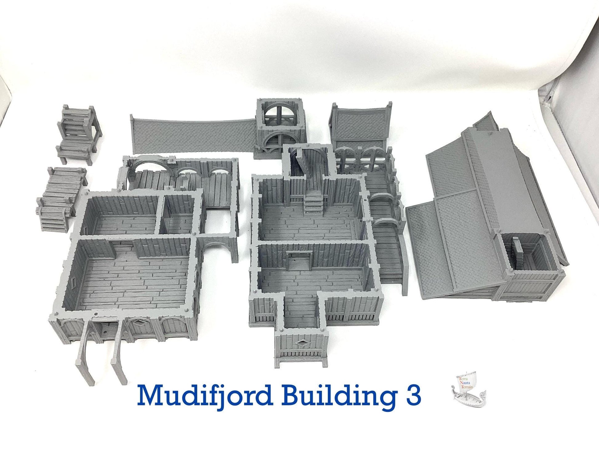 Mudifjord Building 3. A fishing village on a lake.