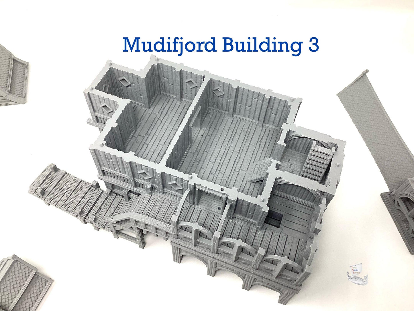 Mudifjord Building 3. A fishing village on a lake.