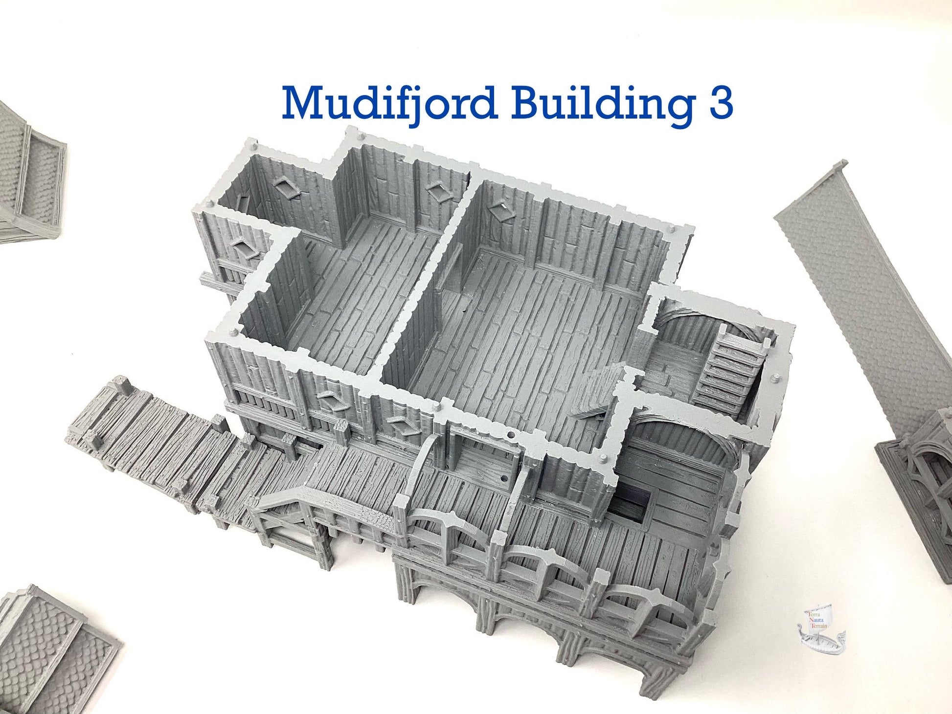 Mudifjord Building 3. A fishing village on a lake.