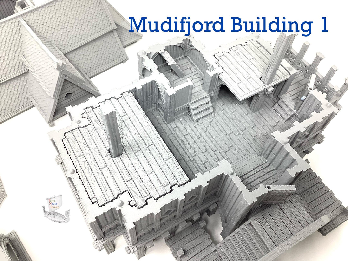 Mudifjord Building 1. A fishing village on a lake.