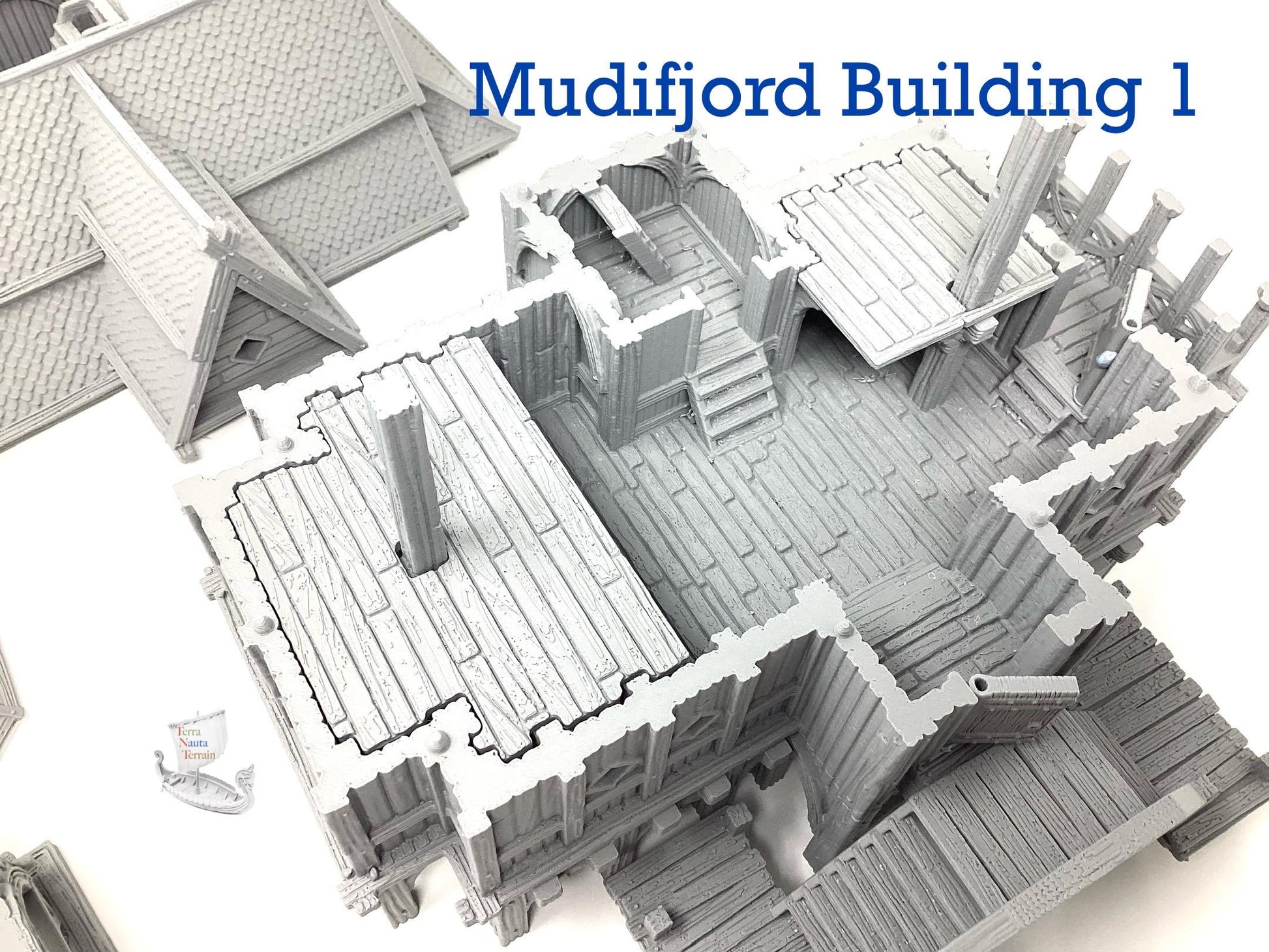 Mudifjord Building 1. A fishing village on a lake.