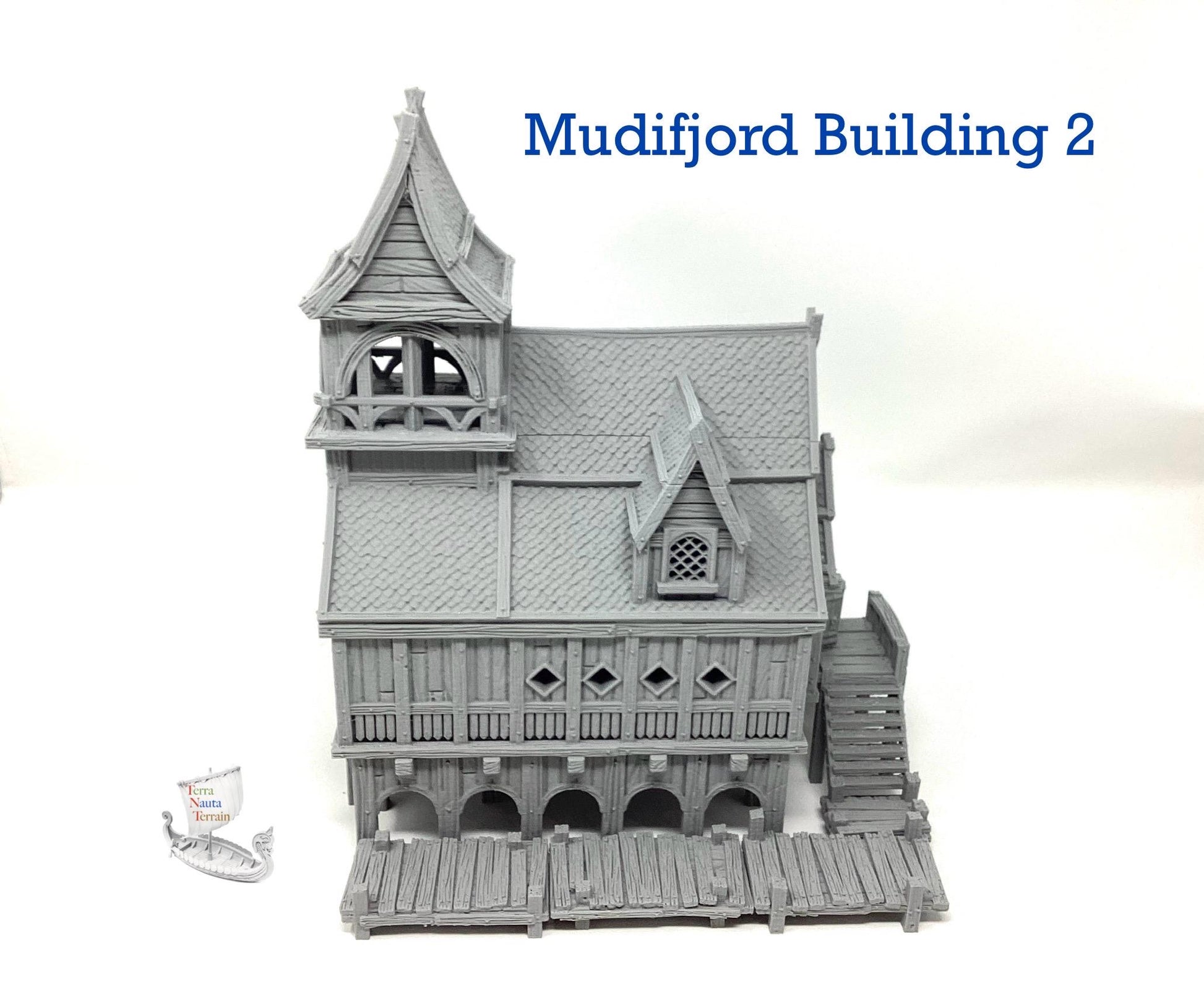 Mudifjord Building 2. A fishing village on a lake.