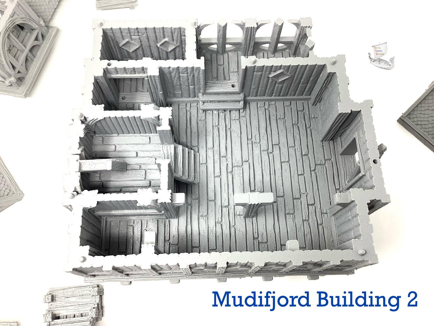 Mudifjord Building 2. A fishing village on a lake.