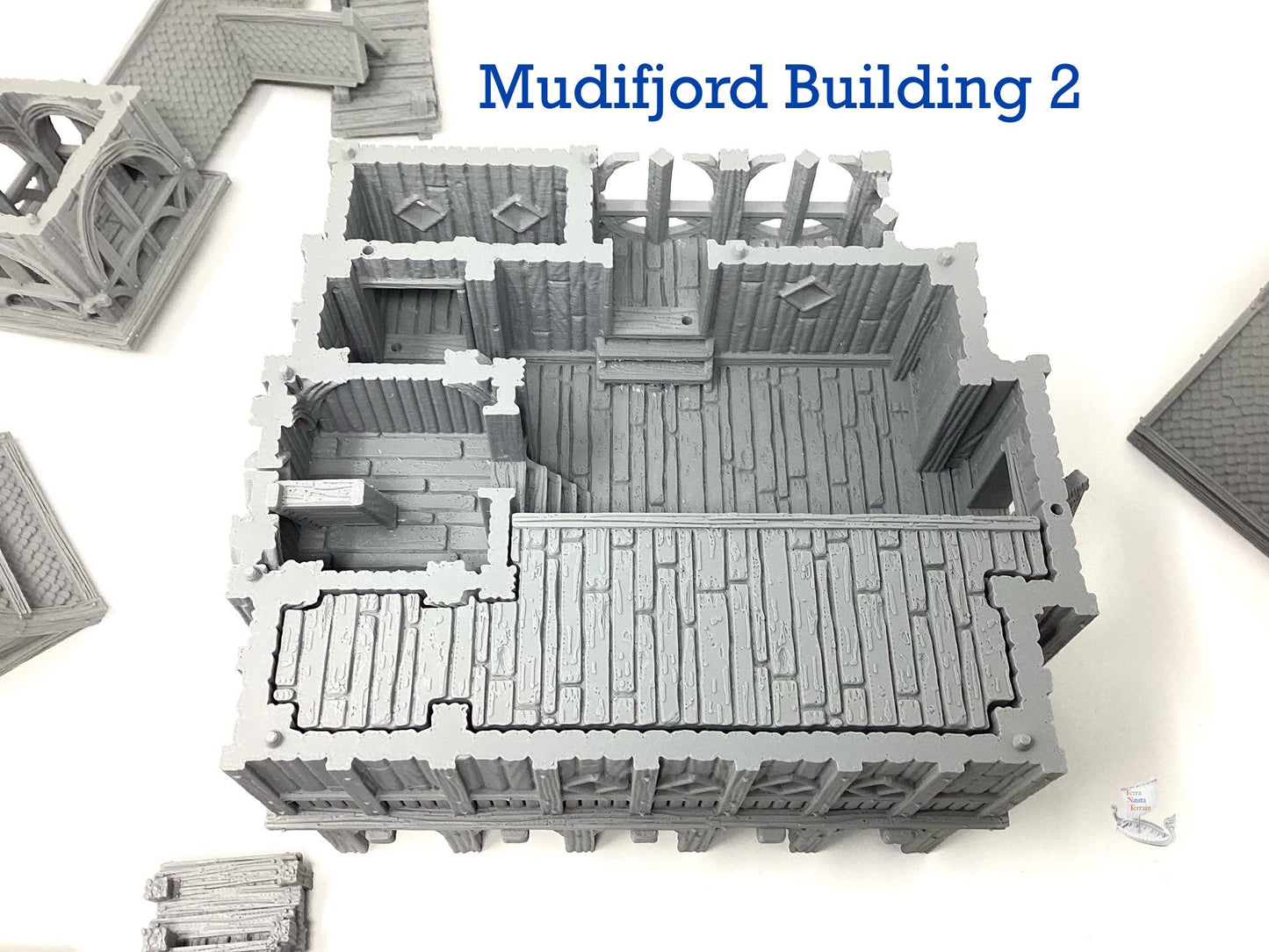 Mudifjord Building 2. A fishing village on a lake.