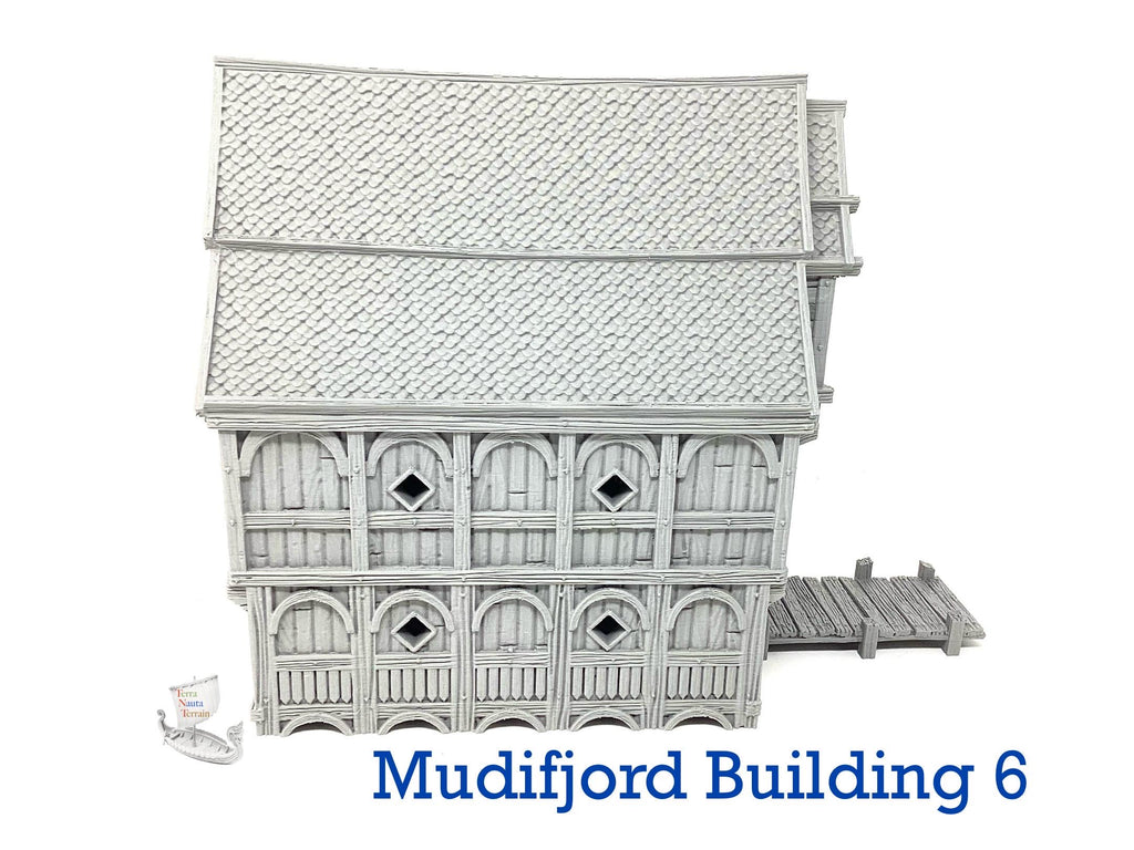 Mudifjord Building 6. A fishing village on a lake.